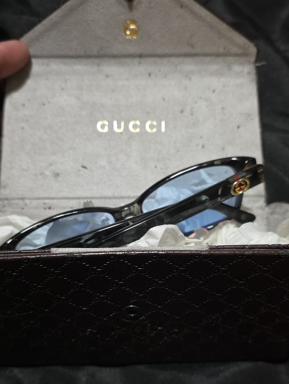 Gucci Unisex Black Frame Sunglasses with Light Blue Lenses and Gold Accent